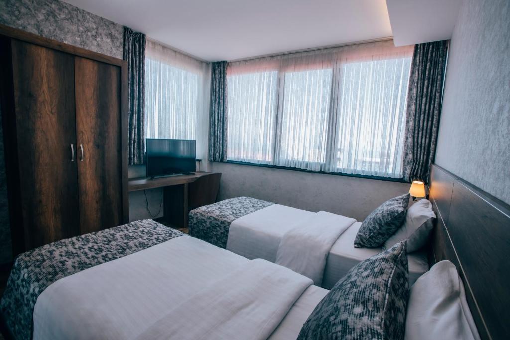 Large Two-Bedroom Suite with Balcony and Sea View